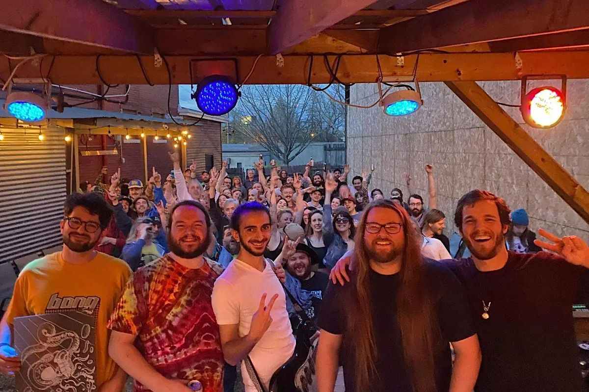 Mr. Please performing live